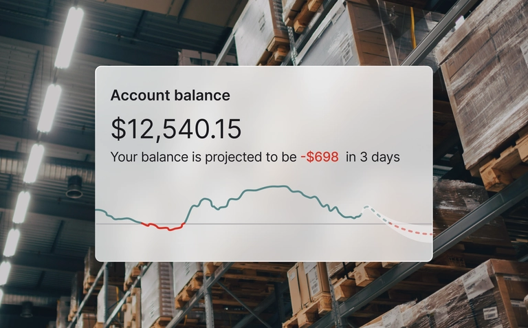 Warehouse shelves with account balance dashboard overlay showing projected negative cash flow in three days.
